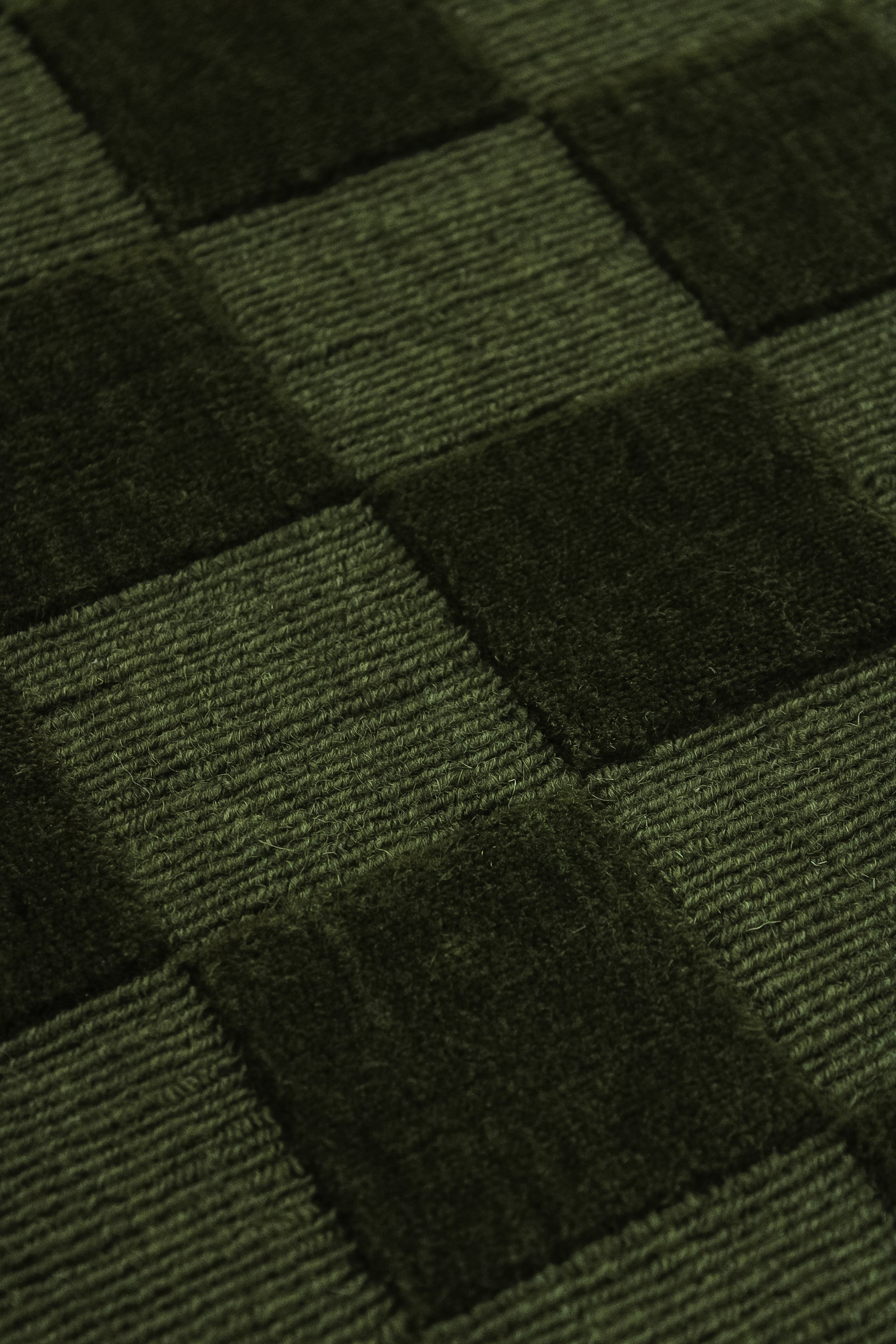 Nærbilde av et teksturert grønt stoff