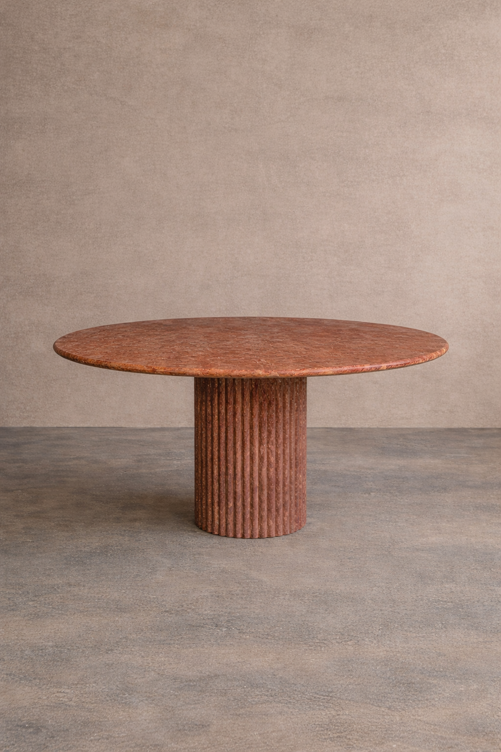 red Samara Round Dining Table in solid Red Travertine. 110 × 75 cm. 